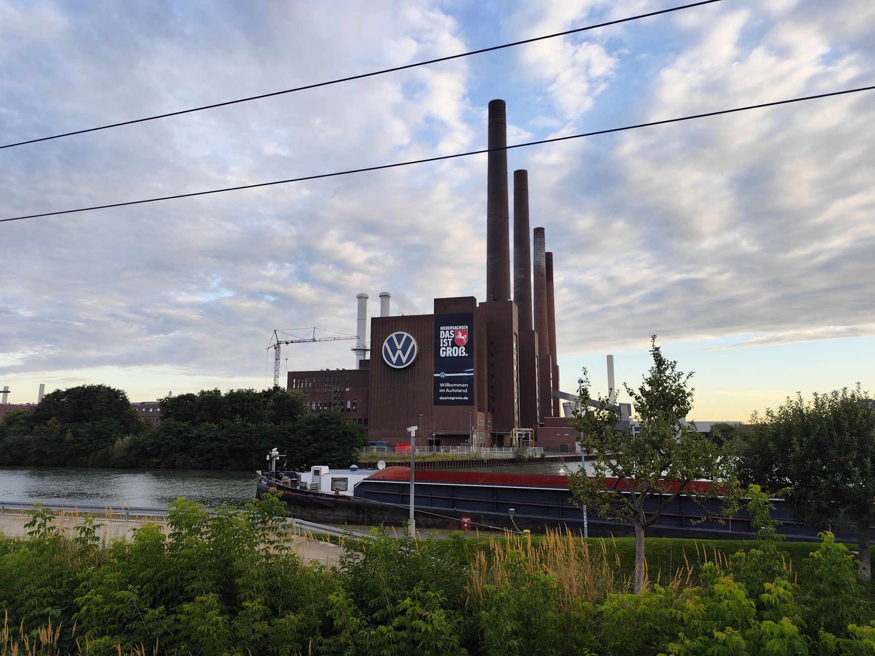 Scenic view of the Volkswagen plant in Wolfsburg, Germany along the Mittelland Canal.